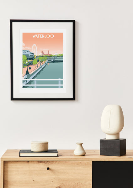 London Waterloo art print in black frame on wall above desk